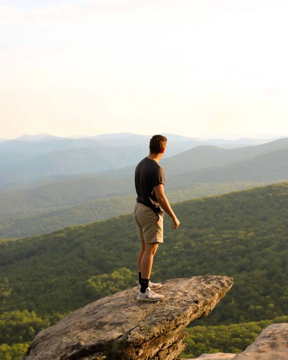 man standing on a mountain